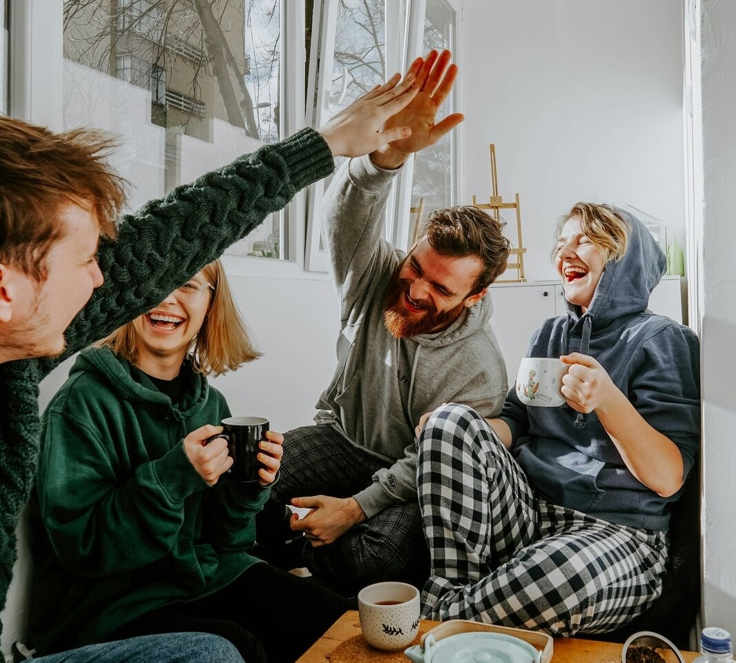 Persons having a good time in a clean room